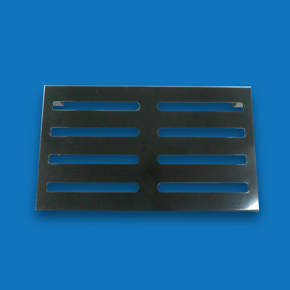 A top view of a large incline black guitar effects pedalboard made of single sheet of aluminium with 2 legs and rubber bushings.