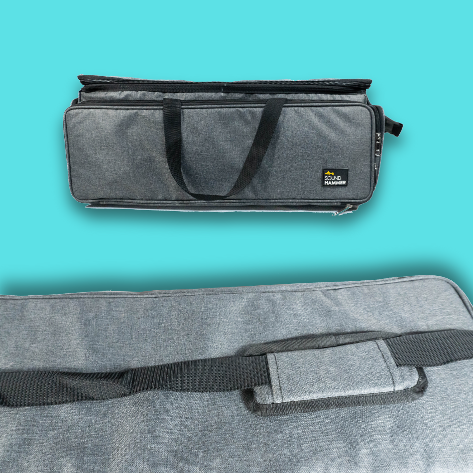 Two views of top cable bag large with close up of carry handle and front pouch.