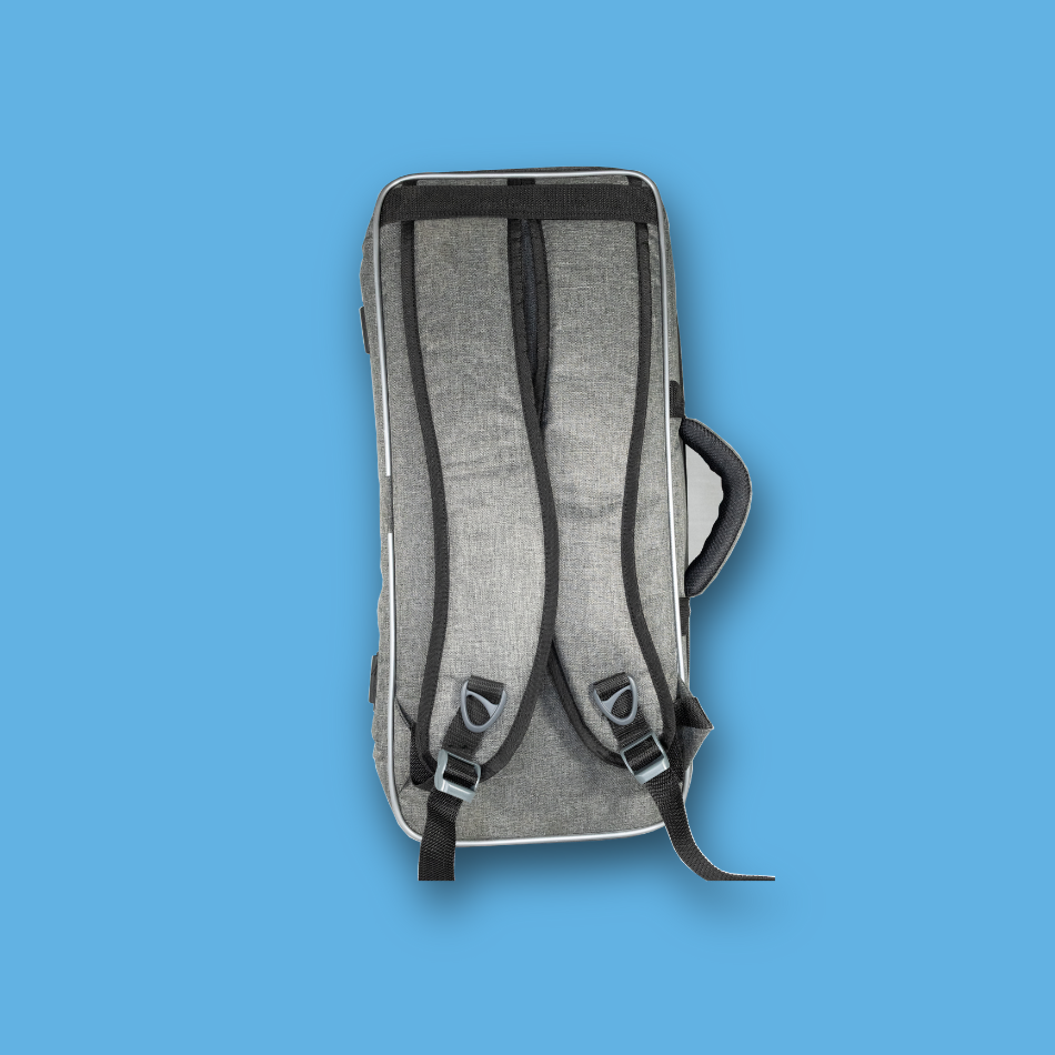 Gray pedalboard gig bag on a blue background