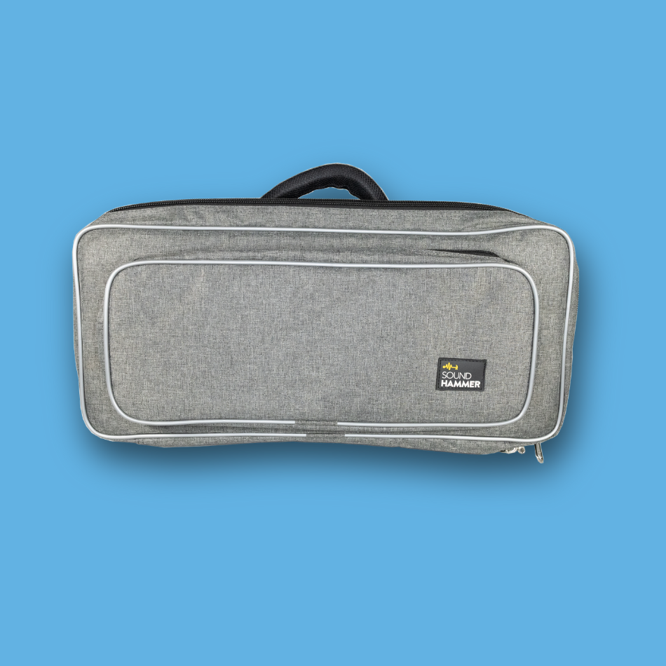 Gray pedalboard gig bag with a brand logo on a blue background