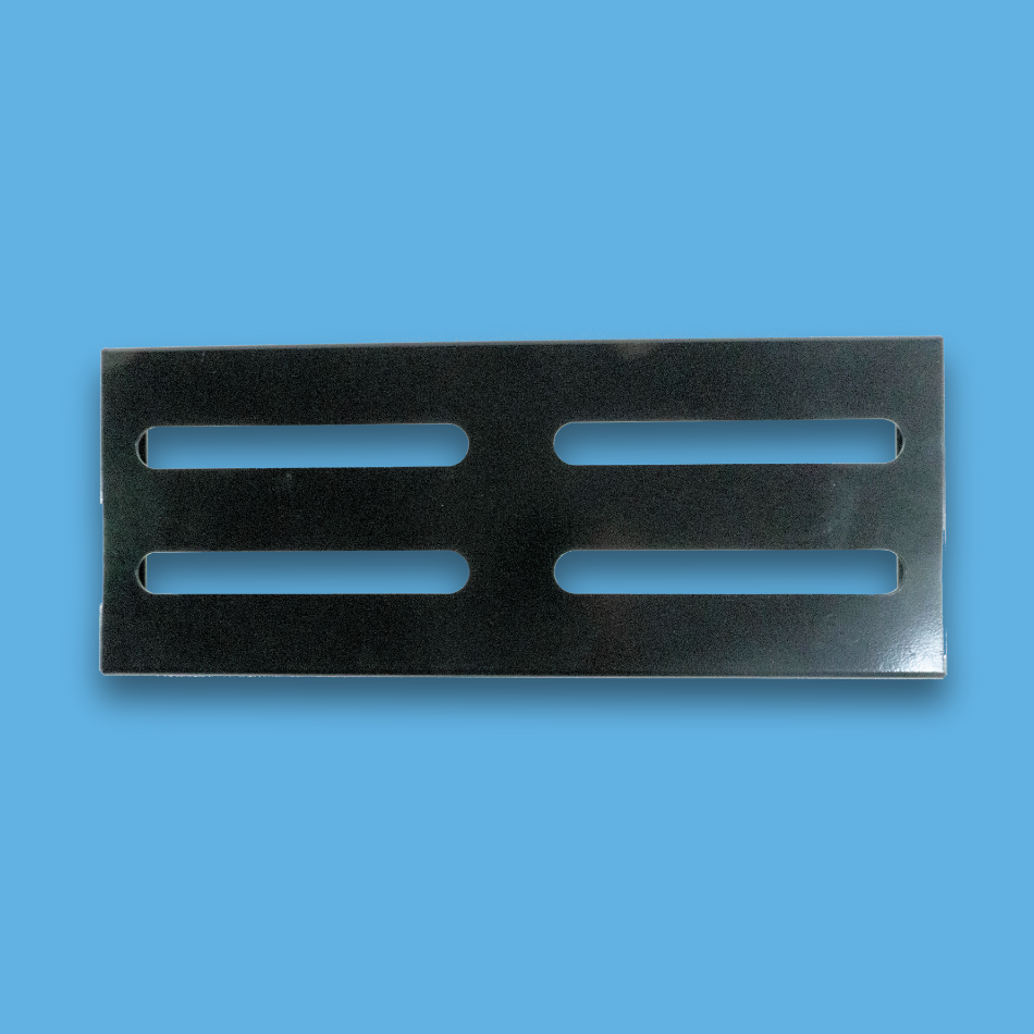 A top view of a long incline black guitar effects pedalboard made of single sheet of aluminium with 2 legs and rubber bushings.