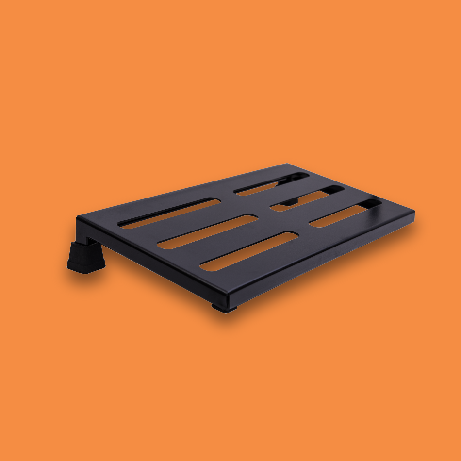 An angled view of a medium incline black guitar effects pedalboard made of single sheet of aluminium with 2 legs and rubber bushings.