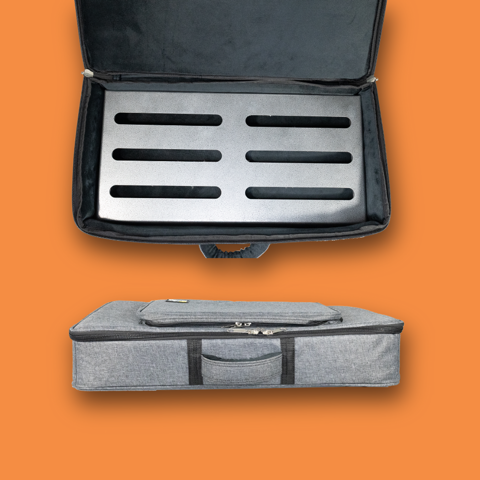 Gray pedalboard gig bag with open lid on a dark orange background