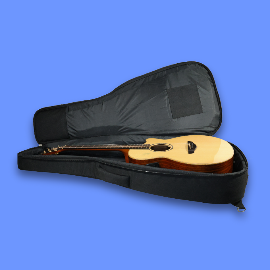A open view of acoustic guitar bag with a guitar inside.