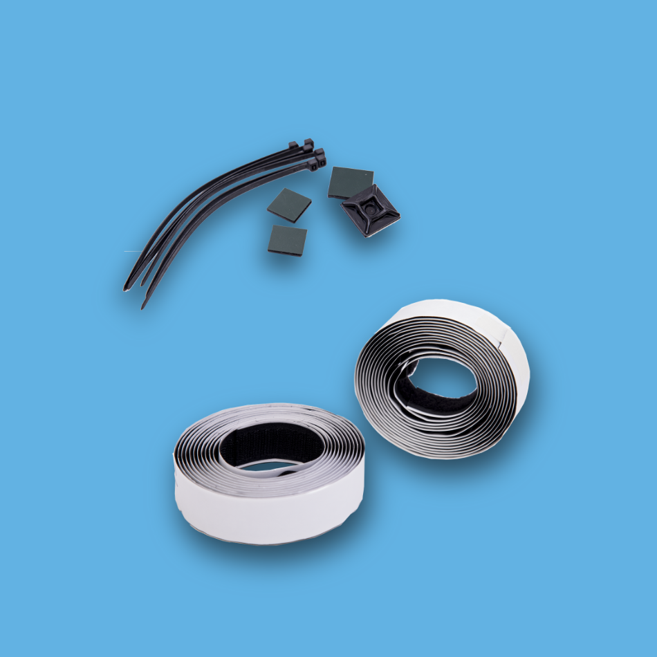 Cable ties and adhesive strips on a blue background