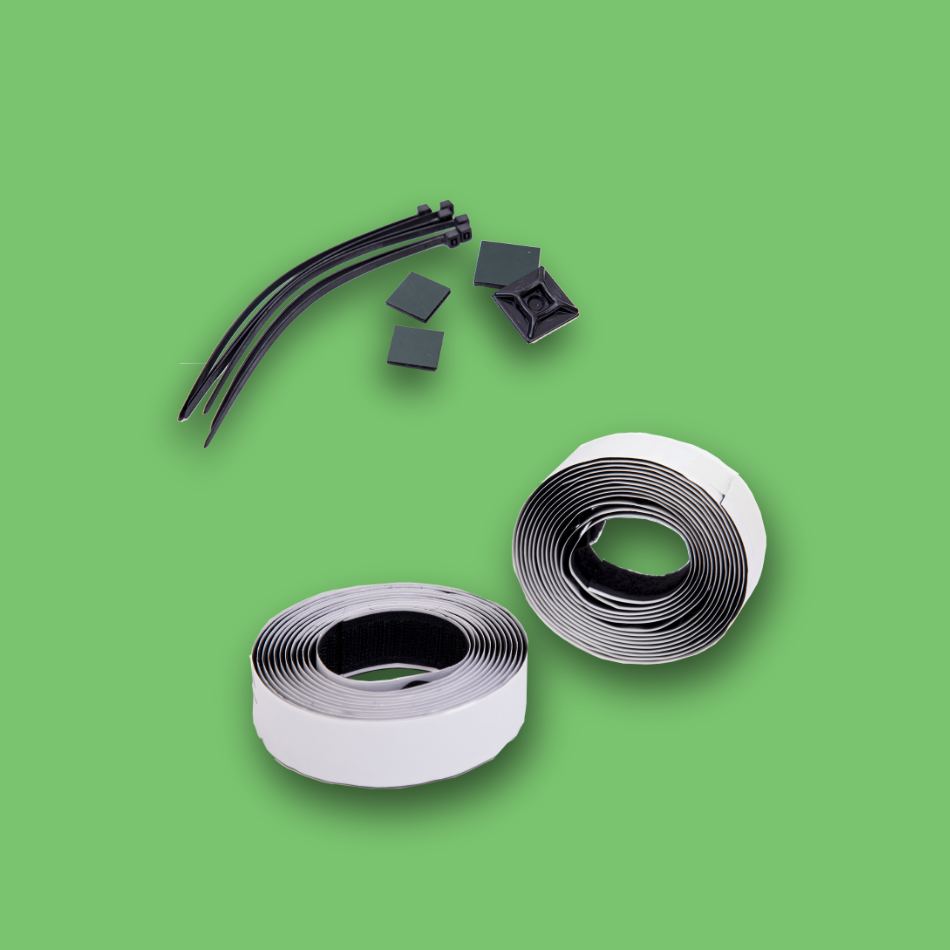 Cable ties and clips on a green background